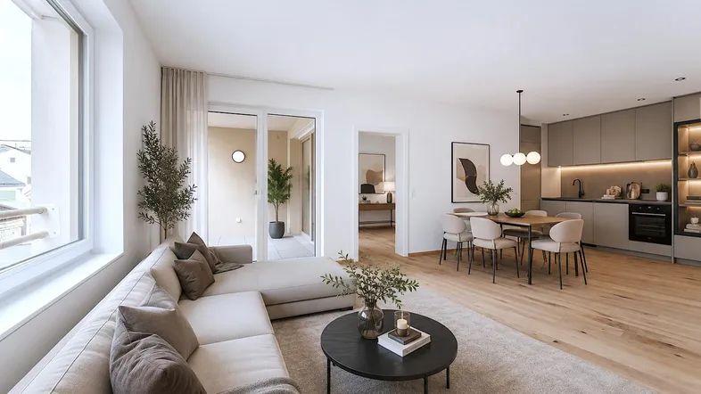 Helles, offenes Wohnzimmer mit integrierter Küche, Essbereich und Zugang zur Loggia.