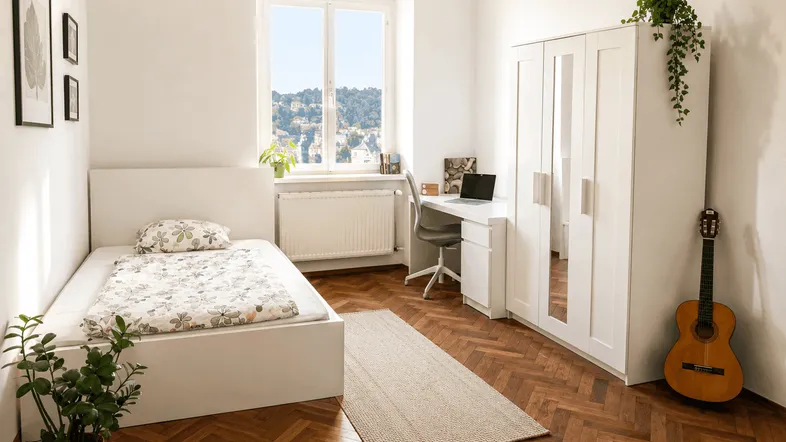 Helles Schlafzimmer mit Parkettboden, Einzelbett, Schreibtisch und Kleiderschrank, ideal für Studenten oder Gäste.