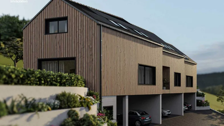 Moderne Reihenhäuser mit Holzfassade und integrierten Carports, umgeben von grüner Landschaft.