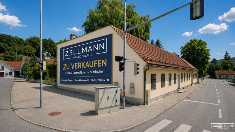 Gebäude an einer Straßenecke mit Verkaufsbanner und umliegender Infrastruktur unter blauem Himmel.