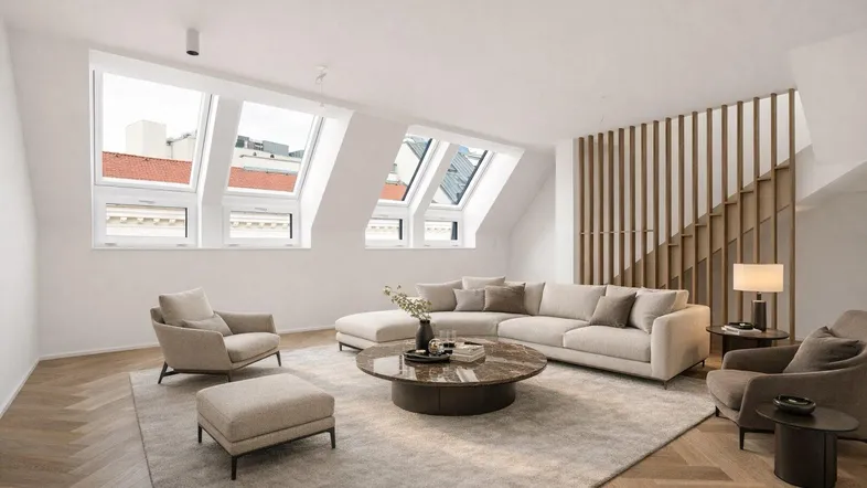 Helles Wohnzimmer im Dachgeschoss mit modernen Möbeln, Dachfenstern und Fischgrätparkett.