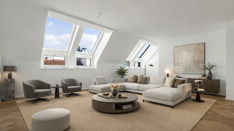Helles, modern eingerichtetes Wohnzimmer im Dachgeschoss mit großen Dachfenstern und Parkettboden.