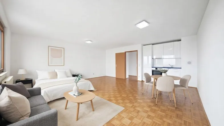 Helles Studio-Apartment mit modernem Design, integrierter Küchenzeile und Parkettboden, ideal für Einzelpersonen.