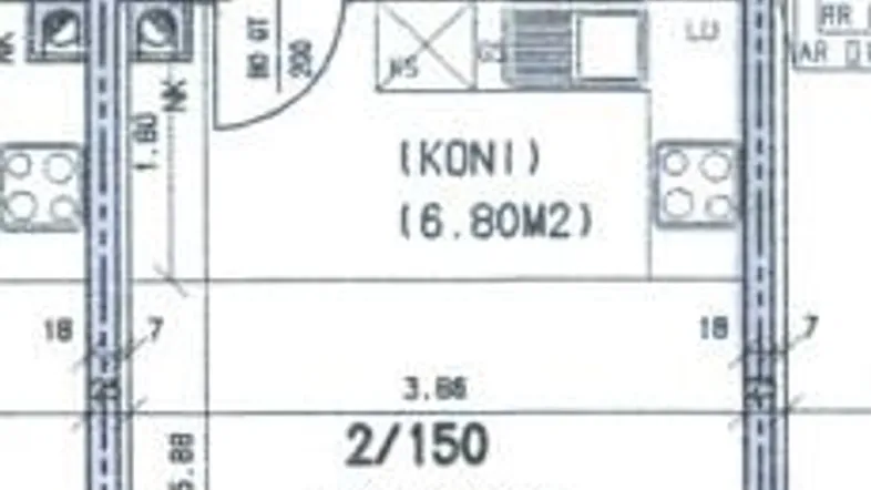 Grundriss einer Wohnung mit offener Wohnküche, Bad, separatem WC und Loggia.
