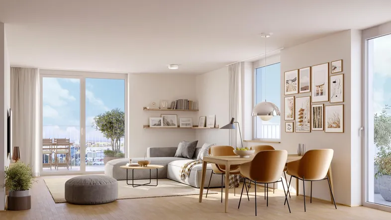 Heller offener Wohn-Essbereich mit modernem Design, Holzboden und Zugang zum Balkon.