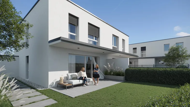 Moderne Doppelhaushälfte mit Terrasse, Garten und Außenbereich für Entspannung.