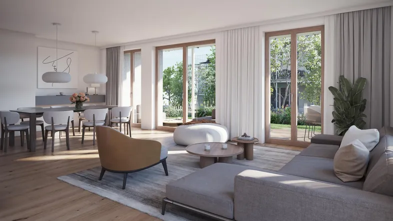 Helles, offenes Wohn-Esszimmer mit Holzboden, modernen Möbeln und Zugang zum Garten.