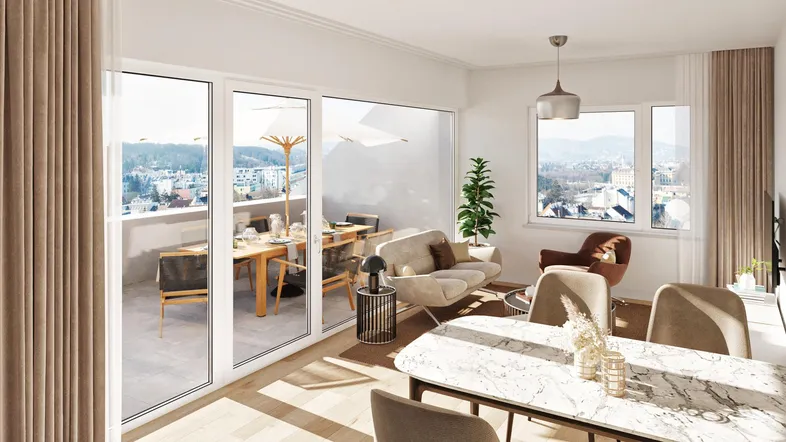 Heller Wohn-Essbereich mit Zugang zu einer großen Terrasse und weitem Blick über die Stadt.