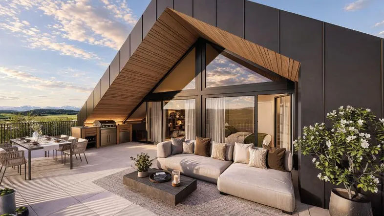 Moderne Dachterrassenwohnung mit Außenküche, Lounge-Bereich und weitem Bergblick.