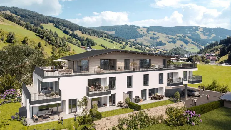 Moderne Architektur in alpiner Landschaft mit Balkonen, Dachterrasse und Bergblick.