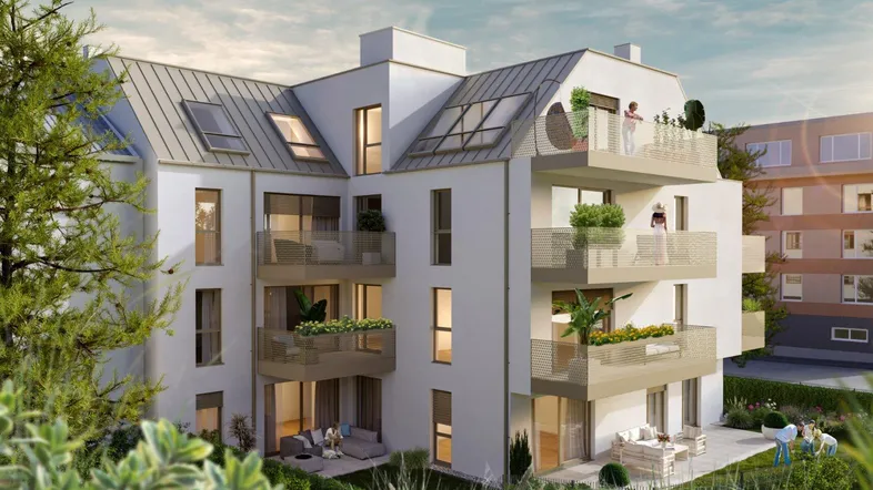 Moderne Wohnanlage mit mehreren Balkonen, Terrassen und ansprechender Architektur in grüner Umgebung.