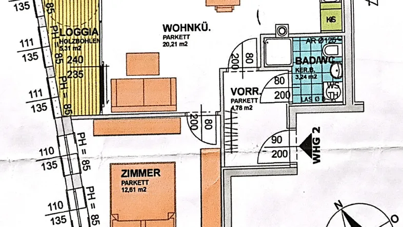 Grundriss einer kompakten Wohnung mit Wohnküche, Schlafzimmer, Bad und Loggia.