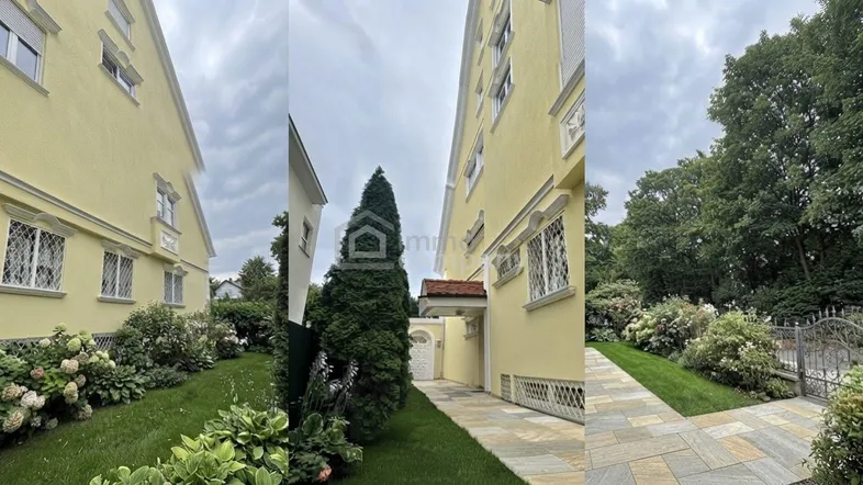 Gepflegter Gartenbereich mit üppiger Bepflanzung und einem Weg entlang der gelben Hausfassade.