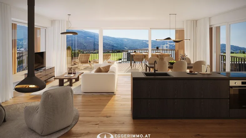 Lichtdurchfluteter offener Wohn-Essbereich mit moderner Küche, Kamin und Zugang zur Terrasse mit Bergblick.