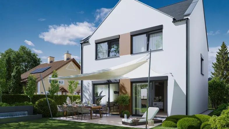 Moderne Doppelhaushälfte mit großer Terrasse, Garten und Sonnensegel für entspannte Stunden im Freien.