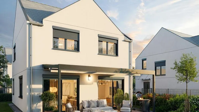 Moderne Doppelhaushälfte mit großer Terrasse, Garten und Außenbereich für Entspannung.