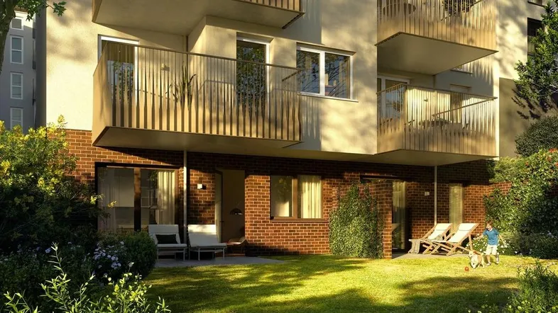 Erdgeschosswohnung mit privatem Garten, Terrasse und Balkonen an einem modernen Gebäude.