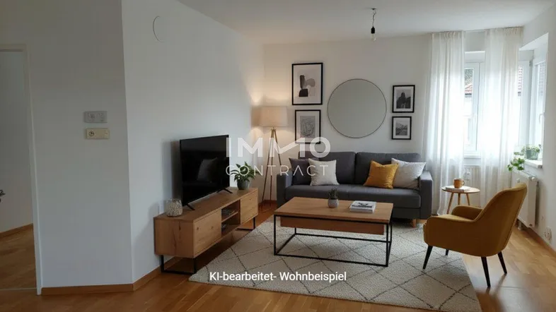 Helles Wohnzimmer mit Parkettboden, moderner Einrichtung und Blick ins Grüne.
