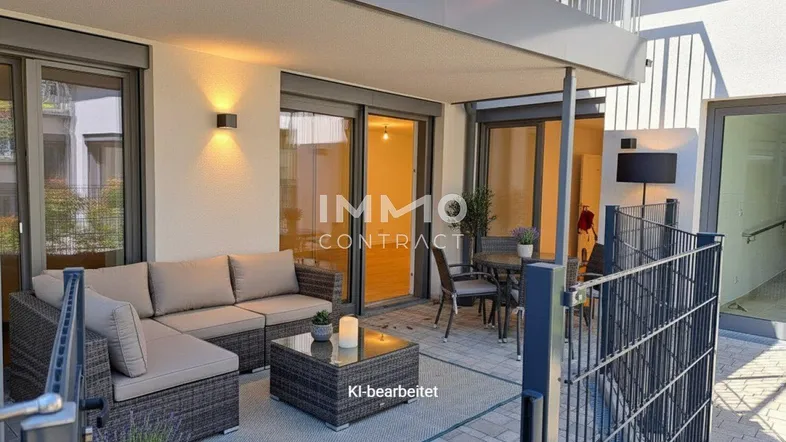 Geräumige Terrasse mit bequemen Outdoor-Möbeln und Zugang zu den Innenräumen.