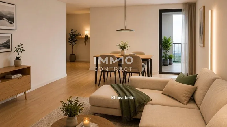 Heller Wohn- und Essbereich mit modernem Sofa, Holzboden und Zugang zum Balkon.