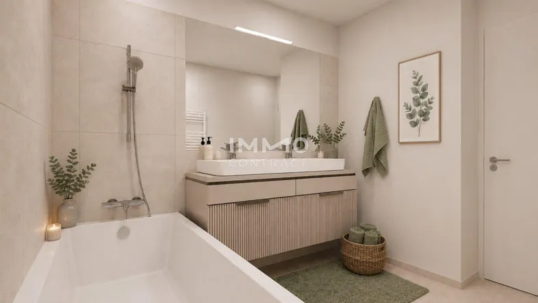 Modernes Badezimmer mit Badewanne, Doppelwaschbecken und großem Spiegel.