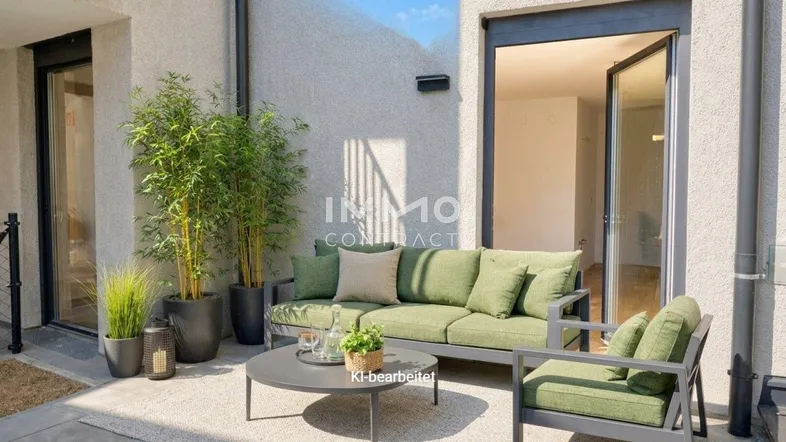 Gemütliche Terrasse mit modernen Gartenmöbeln und Pflanzen, ideal zum Entspannen im Freien.