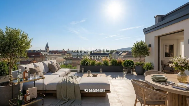 Großzügige Dachterrasse mit moderner Lounge-Möblierung und weitem Blick über die Stadt.