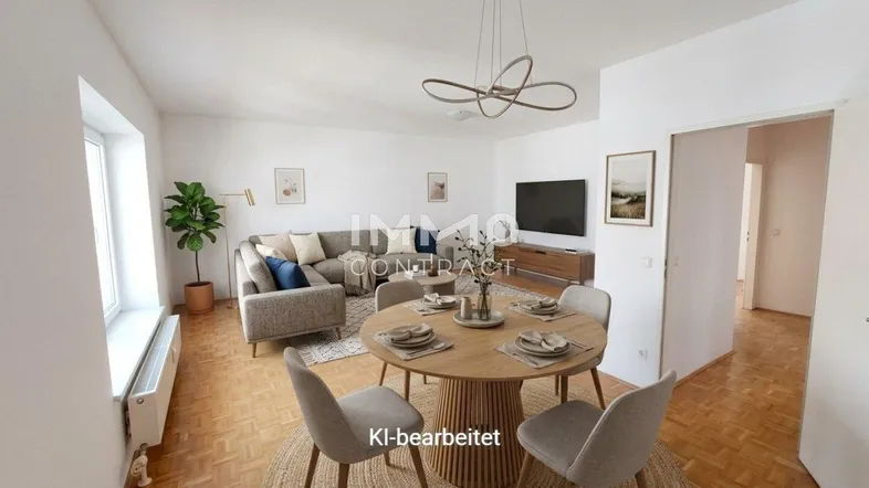 Virtuell inszenierter Wohn-Essbereich mit modernem Mobiliar, Parkettboden und viel Tageslicht.