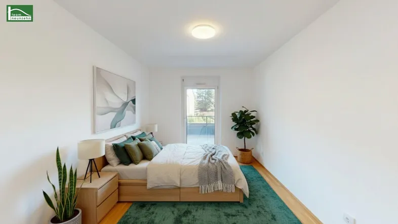 Helles Schlafzimmer mit modernem Bett, grünen Akzenten und Zugang zum Balkon.
