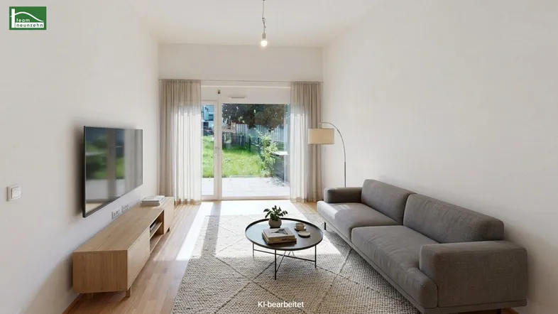 Helles Wohnzimmer mit modernem Sofa, Fernseher und direktem Zugang zur Terrasse und zum Garten.