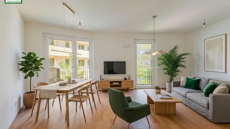 Heller, offener Wohn- und Essbereich mit Holzboden, modernen Möbeln und Zugang zum Balkon.