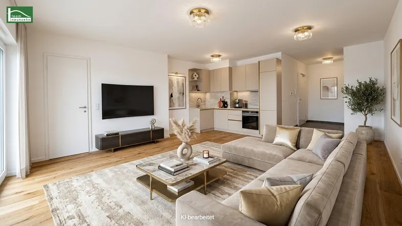 Modernes, offenes Wohnzimmer mit integrierter Küche, Parkettboden und stilvoller Einrichtung.