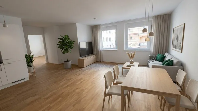 Helles, offen gestaltetes Wohn-Esszimmer mit Parkettboden und moderner Einrichtung.