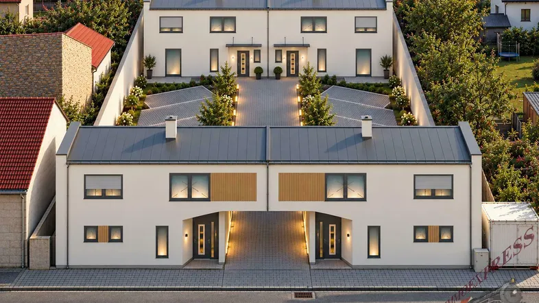 Moderne Doppelhaushälften mit weißer Fassade, Satteldach und gepflegten Außenanlagen in einer Wohnsiedlung.
