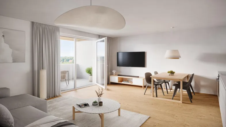 Heller, offener Wohn- und Essbereich mit Holzboden, modernen Möbeln und Zugang zum Balkon.