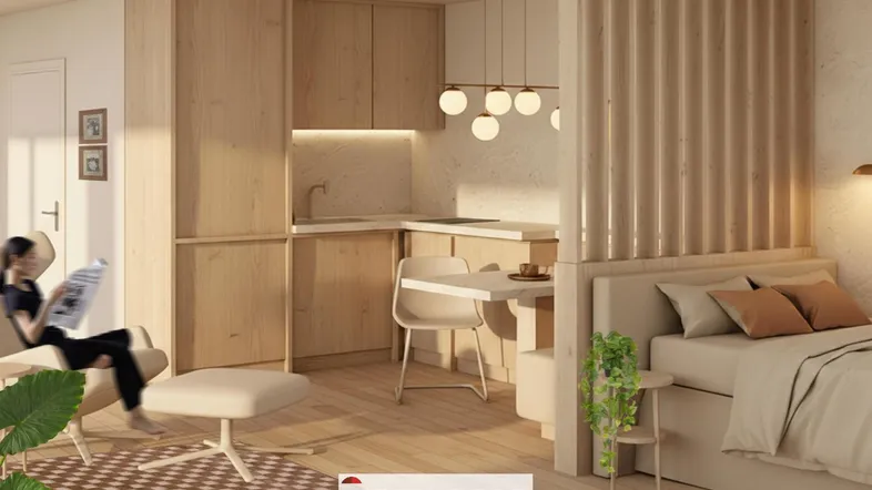 Helles Studio-Apartment mit integrierter Küchenzeile, Schlafbereich und modernem Design.