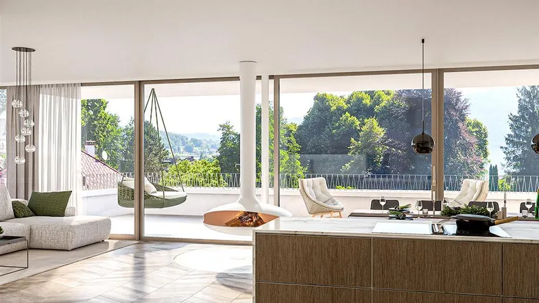 Moderner offener Wohn-Essbereich mit Hängekamin, großen Fenstern und Zugang zu einem Balkon mit Weitblick.