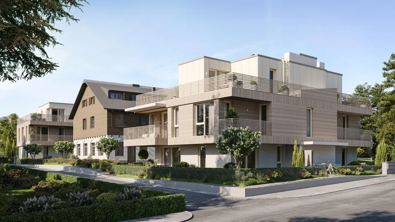 Moderne Wohnanlage mit unterschiedlichen Architekturstilen, Balkonen und gepflegten Außenbereichen.