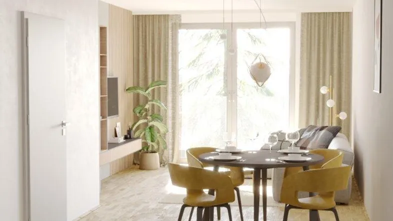 Offener Wohn- und Essbereich mit Holzboden, modernen Möbeln und viel Tageslicht.