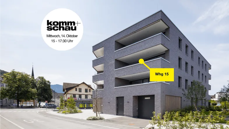 Modernes Mehrfamilienhaus mit Balkonen und einer Markierung für Wohnung 15.
