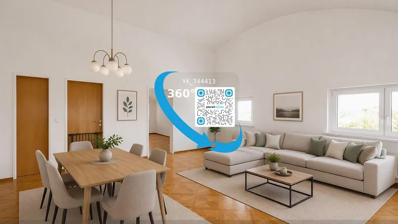 Helles, modern eingerichtetes Wohn-Esszimmer mit Parkettboden und gewölbter Decke.
