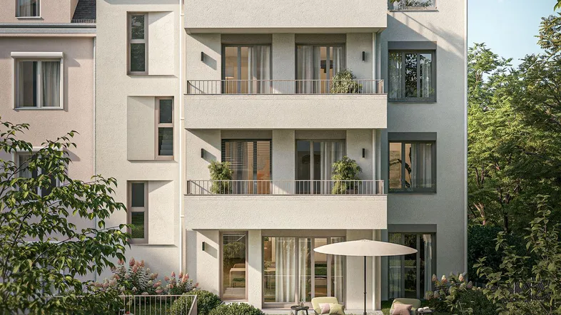 Moderne Wohnanlage mit begrüntem Gartenbereich und möblierter Terrasse im Erdgeschoss.