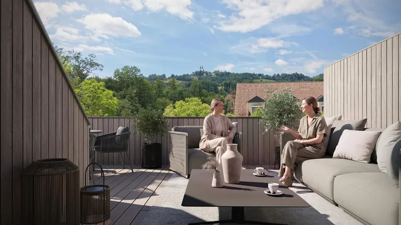 Moderne Dachterrasse mit bequemen Loungemöbeln und weitem Blick ins Grüne.