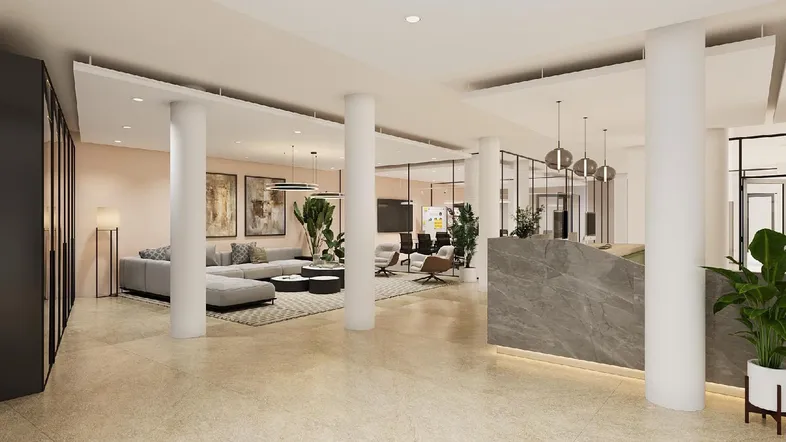 Elegante Lobby mit Empfangsbereich, bequemen Sitzgelegenheiten und modernen Säulen in einem Bürogebäude.
