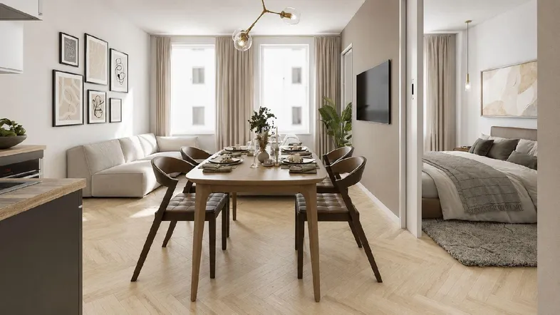 Helles, offenes Wohn- und Esszimmer mit Parkettboden und moderner Einrichtung, angrenzend an eine Küche und ein Schlafzimmer.