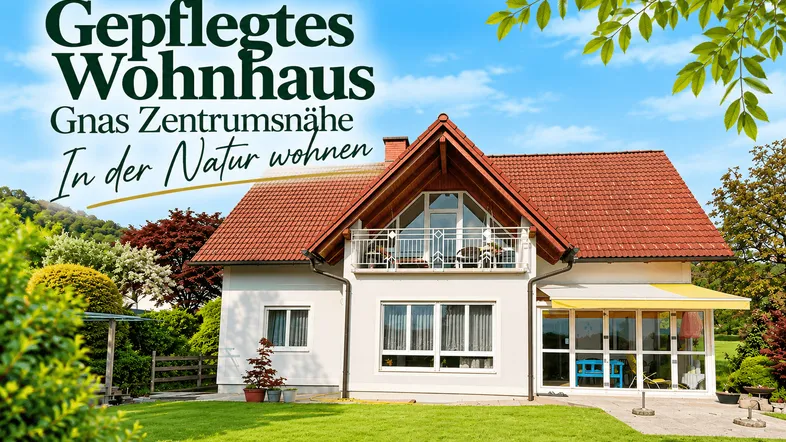 Gepflegtes Einfamilienhaus mit rotem Ziegeldach, Balkon, Wintergarten und großem, sonnigen Garten.