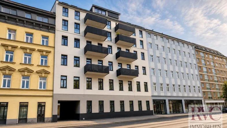 Modernes Wohngebäude mit mehreren Balkonen und einer ansprechenden Fassadengestaltung in urbaner Umgebung.