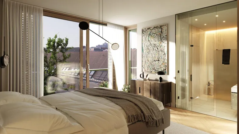 Modernes Schlafzimmer mit großen Fenstern, Holzboden und integriertem Badezimmer.