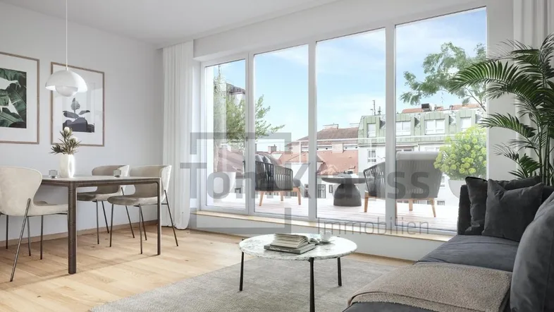 Helles Wohn- und Esszimmer mit Holzboden, großen Fenstern und Zugang zu einer Terrasse.