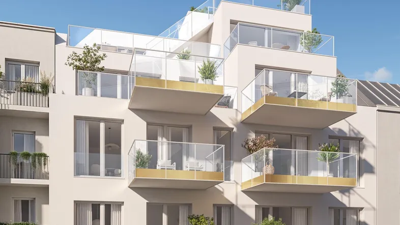 Moderne Wohnanlage mit mehreren Balkonen und Dachterrassen, die eine helle und offene Architektur aufweisen.